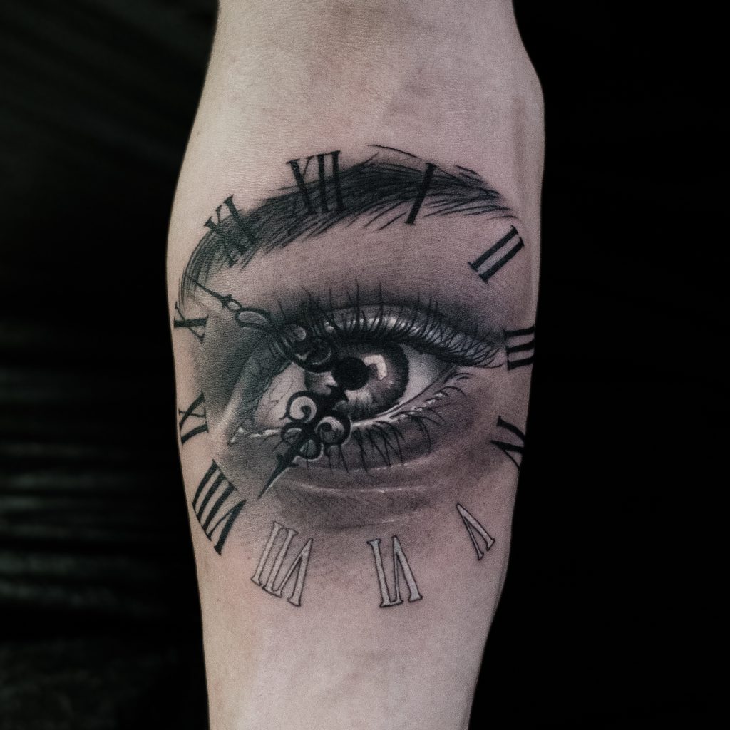 Tattoo of an eye with clock helsinki