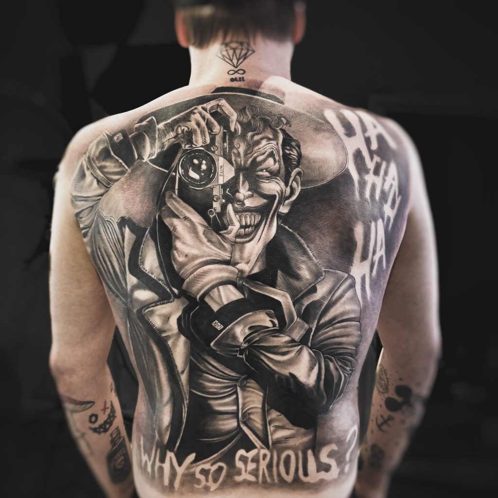 Realistic joker back piece tattoo helsinki